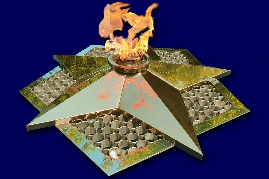 Вечный огонь в Нижневартовске красивое фото пламени звезды вечного огня Вечный огонь в Нижневартовске красивое фото пламя газовой горелки для звезды вечного огня